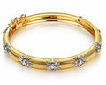 Golden Sunburst Mixed Metal Bangle