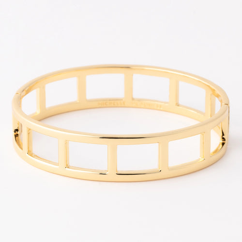 Alexa Bangle Bracelet gold with a grid pattern on a white background